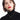 Woman with red lipstick wearing gold necklace