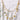 Gold necklace with round pendants on a textured white background