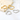 This image displays a pair of elegant heart-shaped earrings, available in two distinct finishes: classic gold and modern silver. The earrings are designed with a minimalist aesthetic, featuring a smooth, contourshaped outline that highlights their sleek and sophisticated appeal.