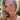 Blonde woman wearing gold vintage style choker necklace
