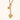 Gold necklace with a heart-shaped pendant on a light beige background