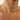 Pearl necklace worn by a person on a plain background