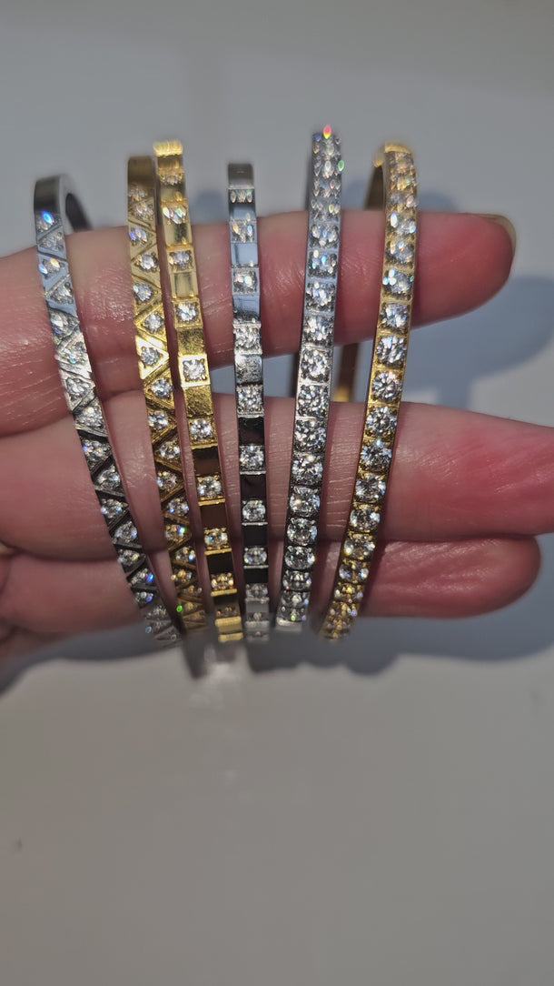 Video of silver and gold bangles.