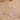 Two necklaces with sun and moon designs on a textured fabric background